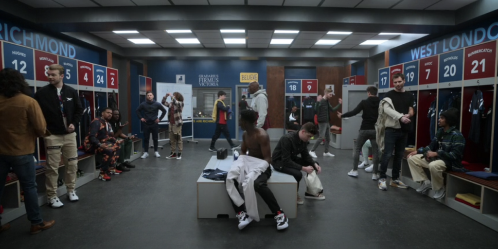 Team Locker Room Scene with Many Shoes in Ted Lasso S03E01 “Smells Like Mean Spirit” (2023)